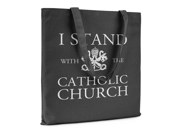 Black tote bag that reads I Stand With The Catholic Church.