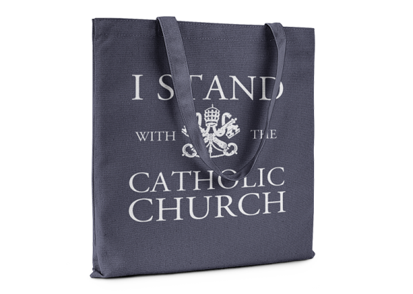 Navy blue tote bag that reads I Stand With The Catholic Church.