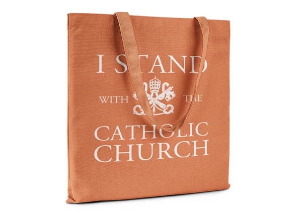 Orange tote bag that reads I Stand With The Catholic Church.