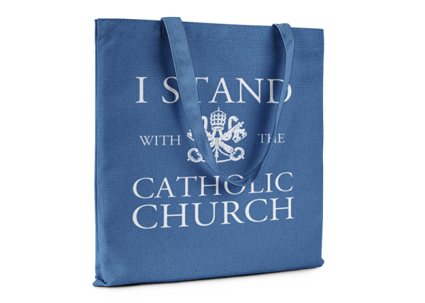 Royal blue tote bag that reads I Stand With The Catholic Church.