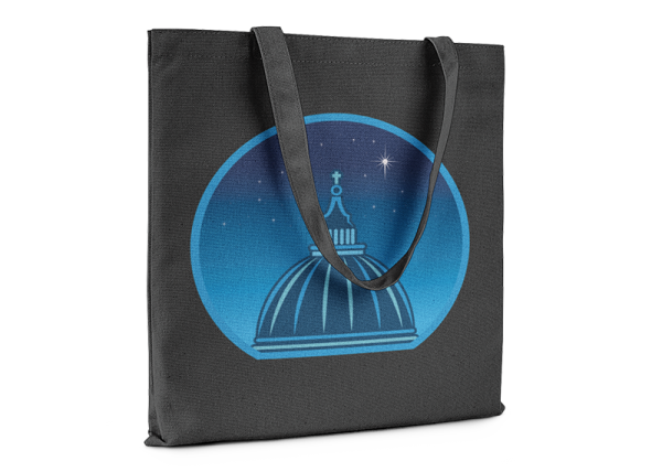 Black tote bag printed with a graphic of a cathedral cupola against a starry night sky.