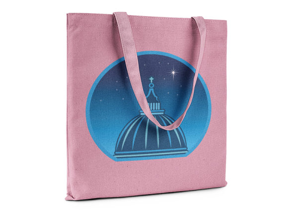 Pink tote bag printed with a graphic of a cathedral cupola against a starry night sky.